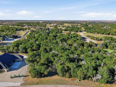 Discover a private 1.228-acre wooded homesite inside The Retreat on The Retreat in Texas - for sale on GolfHomes.com, golf home, golf lot