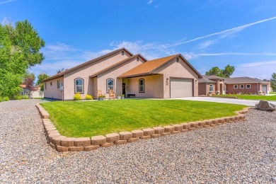 Nestled in the picturesque Cattails Golf Course community in on Cattails Golf Club in Colorado - for sale on GolfHomes.com, golf home, golf lot