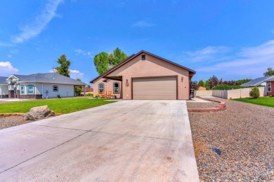 Nestled in the picturesque Cattails Golf Course community in on Cattails Golf Club in Colorado - for sale on GolfHomes.com, golf home, golf lot