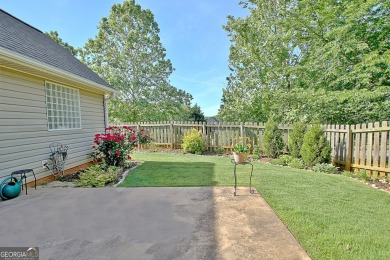 Immaculately maintained ranch home on a beautifully landscaped on Summergrove Golf Club in Georgia - for sale on GolfHomes.com, golf home, golf lot