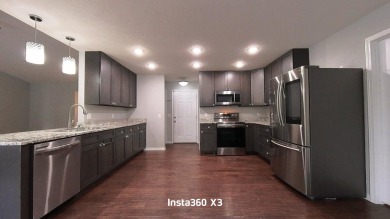 Newer Contemporary Home with a golf course view.  (Hole 14) on West Plains Country Club in Missouri - for sale on GolfHomes.com, golf home, golf lot