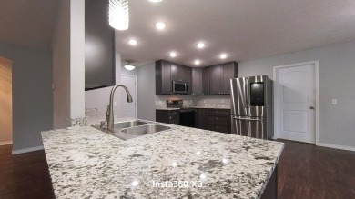 Newer Contemporary Home with a golf course view.  (Hole 14) on West Plains Country Club in Missouri - for sale on GolfHomes.com, golf home, golf lot