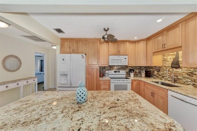 This completely remodeled end-unit villa at Fairways of Capri is on Capri Isle Golf Club in Florida - for sale on GolfHomes.com, golf home, golf lot