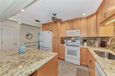 This completely remodeled end-unit villa at Fairways of Capri is on Capri Isle Golf Club in Florida - for sale on GolfHomes.com, golf home, golf lot