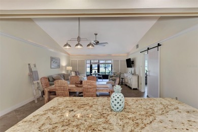 This completely remodeled end-unit villa at Fairways of Capri is on Capri Isle Golf Club in Florida - for sale on GolfHomes.com, golf home, golf lot