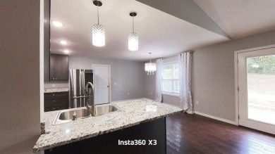 Newer Contemporary Home with a golf course view.  (Hole 14) on West Plains Country Club in Missouri - for sale on GolfHomes.com, golf home, golf lot