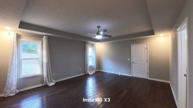 Newer Contemporary Home with a golf course view.  (Hole 14) on West Plains Country Club in Missouri - for sale on GolfHomes.com, golf home, golf lot