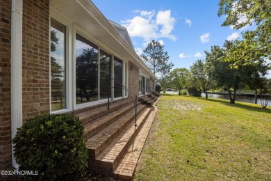 Boating enthusiasts rejoice! With deep water access just steps on Harbour Point Golf Club in North Carolina - for sale on GolfHomes.com, golf home, golf lot