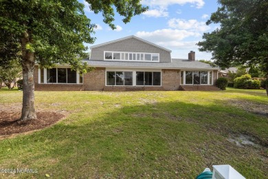 Boating enthusiasts rejoice! With deep water access just steps on Harbour Point Golf Club in North Carolina - for sale on GolfHomes.com, golf home, golf lot