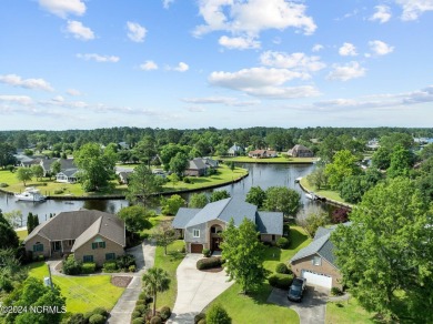 Boating enthusiasts rejoice! With deep water access just steps on Harbour Point Golf Club in North Carolina - for sale on GolfHomes.com, golf home, golf lot