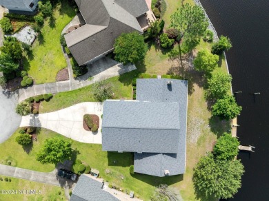 Boating enthusiasts rejoice! With deep water access just steps on Harbour Point Golf Club in North Carolina - for sale on GolfHomes.com, golf home, golf lot