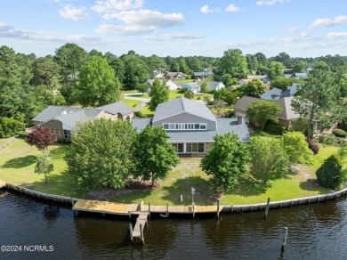 Boating enthusiasts rejoice! With deep water access just steps on Harbour Point Golf Club in North Carolina - for sale on GolfHomes.com, golf home, golf lot