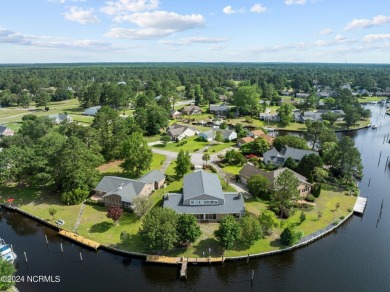 Boating enthusiasts rejoice! With deep water access just steps on Harbour Point Golf Club in North Carolina - for sale on GolfHomes.com, golf home, golf lot