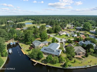 Boating enthusiasts rejoice! With deep water access just steps on Harbour Point Golf Club in North Carolina - for sale on GolfHomes.com, golf home, golf lot