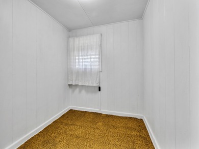 This spacious, classic midcentury Hilo home has been in the same on Hilo Municipal Golf Course in Hawaii - for sale on GolfHomes.com, golf home, golf lot