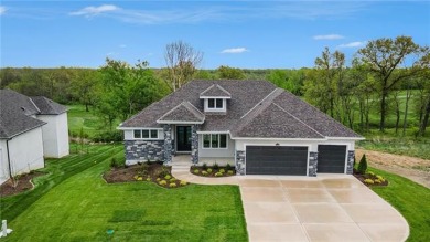 Fantastic open floor plan, large kitchen w/ 9ft island, built-in on Staley Farms Golf Club in Missouri - for sale on GolfHomes.com, golf home, golf lot