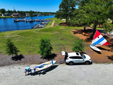 Introducing an extraordinary opportunity to own a luxurious on Harbour Point Golf Club in North Carolina - for sale on GolfHomes.com, golf home, golf lot