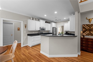 Step into a home that exudes warmth, sophistication, and on Cobbs Glen Country Club in South Carolina - for sale on GolfHomes.com, golf home, golf lot