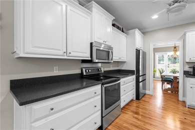 Step into a home that exudes warmth, sophistication, and on Cobbs Glen Country Club in South Carolina - for sale on GolfHomes.com, golf home, golf lot