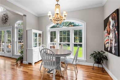 Step into a home that exudes warmth, sophistication, and on Cobbs Glen Country Club in South Carolina - for sale on GolfHomes.com, golf home, golf lot