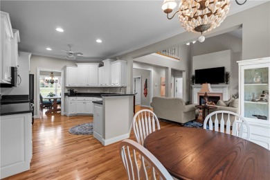 Step into a home that exudes warmth, sophistication, and on Cobbs Glen Country Club in South Carolina - for sale on GolfHomes.com, golf home, golf lot