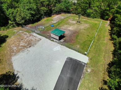 Introducing an extraordinary opportunity to own a luxurious on Harbour Point Golf Club in North Carolina - for sale on GolfHomes.com, golf home, golf lot