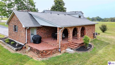 Welcome to this stunning brick home with modern amenities on 4.4 on Elizabethtown Country Club in Kentucky - for sale on GolfHomes.com, golf home, golf lot