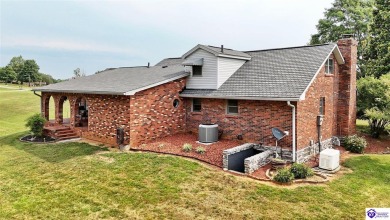 Welcome to this stunning brick home with modern amenities on 4.4 on Elizabethtown Country Club in Kentucky - for sale on GolfHomes.com, golf home, golf lot