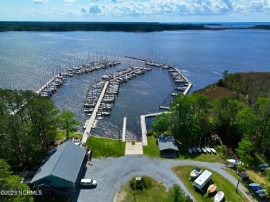 Introducing an extraordinary opportunity to own a luxurious on Harbour Point Golf Club in North Carolina - for sale on GolfHomes.com, golf home, golf lot