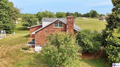 Welcome to this stunning brick home with modern amenities on 4.4 on Elizabethtown Country Club in Kentucky - for sale on GolfHomes.com, golf home, golf lot