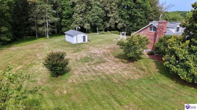 Welcome to this stunning brick home with modern amenities on 4.4 on Elizabethtown Country Club in Kentucky - for sale on GolfHomes.com, golf home, golf lot