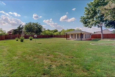 Retreat to this stunning 4-bedroom house with balcony views of on Tangle Ridge Golf Club in Texas - for sale on GolfHomes.com, golf home, golf lot