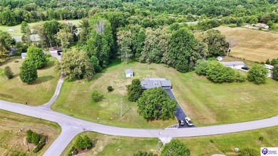 Welcome to this stunning brick home with modern amenities on 4.4 on Elizabethtown Country Club in Kentucky - for sale on GolfHomes.com, golf home, golf lot