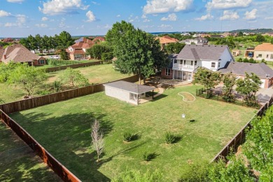 Retreat to this stunning 4-bedroom house with balcony views of on Tangle Ridge Golf Club in Texas - for sale on GolfHomes.com, golf home, golf lot