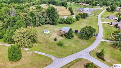 Welcome to this stunning brick home with modern amenities on 4.4 on Elizabethtown Country Club in Kentucky - for sale on GolfHomes.com, golf home, golf lot