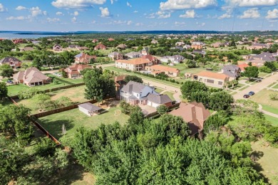 Retreat to this stunning 4-bedroom house with balcony views of on Tangle Ridge Golf Club in Texas - for sale on GolfHomes.com, golf home, golf lot