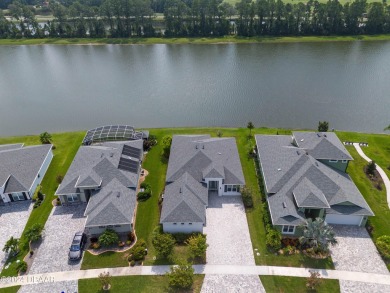 Located in the prestigious Venetian Bay, this custom-designed on Venetian Bay Golf Course in Florida - for sale on GolfHomes.com, golf home, golf lot