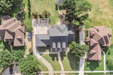 Retreat to this stunning 4-bedroom house with balcony views of on Tangle Ridge Golf Club in Texas - for sale on GolfHomes.com, golf home, golf lot