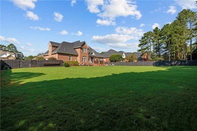 Step into a home that exudes warmth, sophistication, and on Cobbs Glen Country Club in South Carolina - for sale on GolfHomes.com, golf home, golf lot