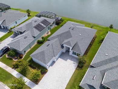 Located in the prestigious Venetian Bay, this custom-designed on Venetian Bay Golf Course in Florida - for sale on GolfHomes.com, golf home, golf lot