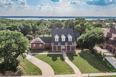 Retreat to this stunning 4-bedroom house with balcony views of on Tangle Ridge Golf Club in Texas - for sale on GolfHomes.com, golf home, golf lot