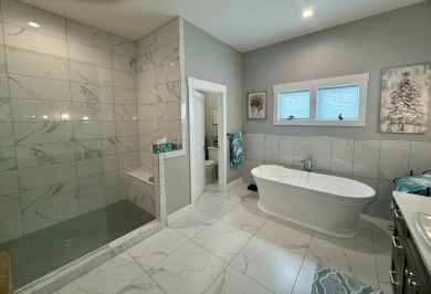 Beautifully built custom home and overlooking The Powder Horn on The Powder Horn Golf Club - Mountain in Wyoming - for sale on GolfHomes.com, golf home, golf lot