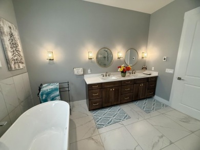 Beautifully built custom home and overlooking The Powder Horn on The Powder Horn Golf Club - Mountain in Wyoming - for sale on GolfHomes.com, golf home, golf lot