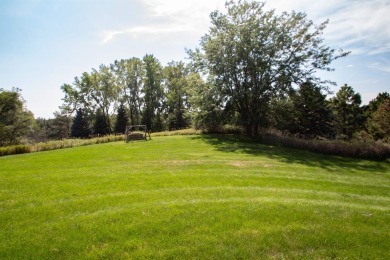 Sitting on  peaceful 2 acres in town, is this classic custom on Sioux City Country Club in Iowa - for sale on GolfHomes.com, golf home, golf lot