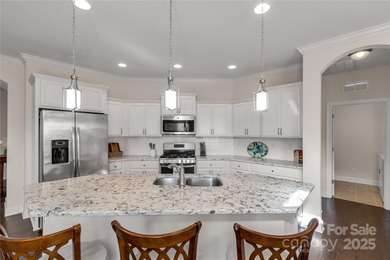 Effortless living with this beautifully maintained 3-bedroom on Emerald Lake Golf Club in North Carolina - for sale on GolfHomes.com, golf home, golf lot