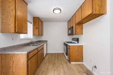 This beautifully updated 3-bedroom, 2-bathroom home offers 1,214 on Oak Tree Country Club in California - for sale on GolfHomes.com, golf home, golf lot