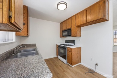 This beautifully updated 3-bedroom, 2-bathroom home offers 1,214 on Oak Tree Country Club in California - for sale on GolfHomes.com, golf home, golf lot