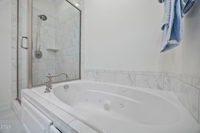 Welcome home to 225 Kenmont Drive, a light-filled, move-in-ready on Devils Ridge Golf Club in North Carolina - for sale on GolfHomes.com, golf home, golf lot