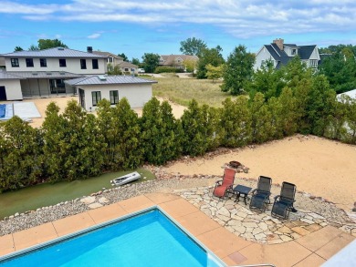 Welcome to this magnificent coastal home nestled in the highly on Grand Beach Municipal Golf Course in Michigan - for sale on GolfHomes.com, golf home, golf lot