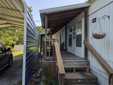 Enjoy a reasonably priced lake home in popular Arrowhead Estates on Arrowhead State Park Golf Course in Oklahoma - for sale on GolfHomes.com, golf home, golf lot